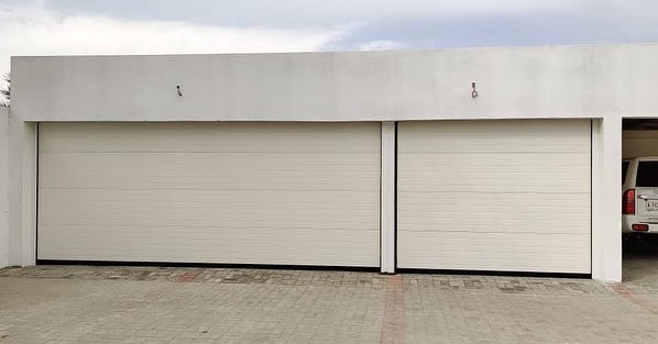 Off-white Overhead Door - باب كراج لون اوف وايت - BAB ALSARAY AUTOMATIC GATES & BARRIERS TRADING LLC