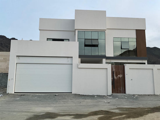 White Overhead Door  - باب كراج لون ابيض - BAB ALSARAY AUTOMATIC GATES & BARRIERS TRADING LLC