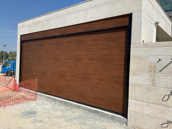 Wood Color Overhead Door - باب كراج لون خشبي - BAB ALSARAY AUTOMATIC GATES & BARRIERS TRADING LLC