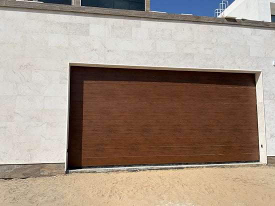 Wood Color Overhead Door - باب كراج لون خشبي - BAB ALSARAY AUTOMATIC GATES & BARRIERS TRADING LLC