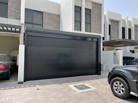 Black Overhead Door - باب كراج لون أسود - BAB ALSARAY AUTOMATIC GATES & BARRIERS TRADING LLC