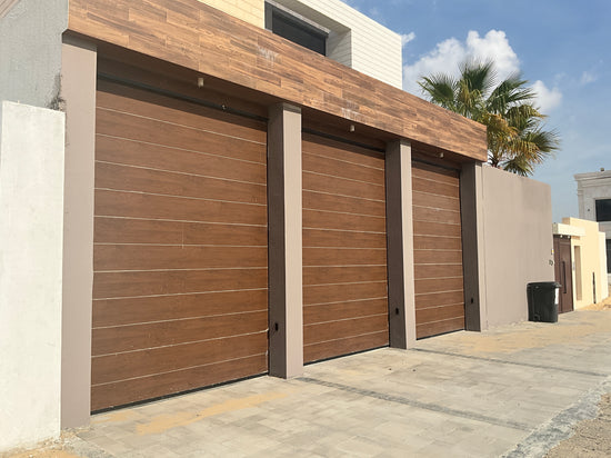Wood Color Overhead Door - باب كراج لون خشبي - BAB ALSARAY AUTOMATIC GATES & BARRIERS TRADING LLC