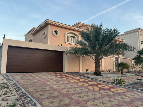 Wood Color Overhead Door - باب كراج لون خشبي - BAB ALSARAY AUTOMATIC GATES & BARRIERS TRADING LLC