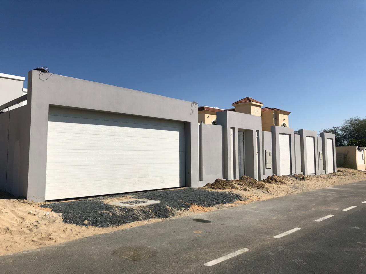 Off-white Overhead Door - باب كراج لون اوف وايت - BAB ALSARAY AUTOMATIC GATES & BARRIERS TRADING LLC