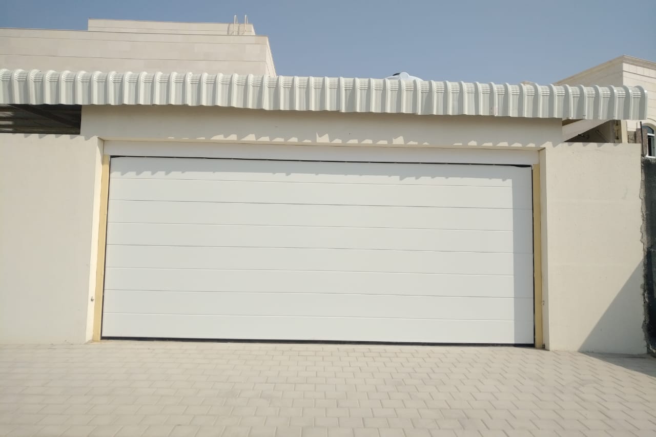 White Overhead Door  - باب كراج لون ابيض - BAB ALSARAY AUTOMATIC GATES & BARRIERS TRADING LLC