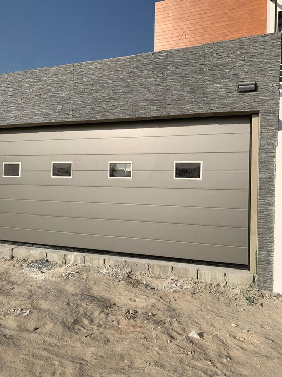 Gray Overhead Door - باب كراج رصاصي - BAB ALSARAY AUTOMATIC GATES & BARRIERS TRADING LLC